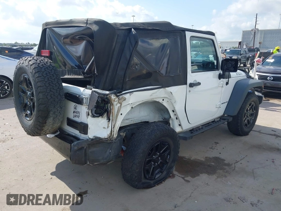 2015 Jeep Wrangler Willys Wheeler with VIN 1C4AJWAG0FL562536, listed as a IAAI auction lot 42384747 with 103,507 mi miles and . Bid and sale history available at DreamBid. Image 4.