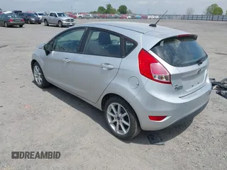 2019 Ford Fiesta SE z VIN 3FADP4EJ9KM107124, wystawiony jako IAAI lot #42067464 z przebiegiem 89 076 mil mil oraz . Historia ofert i sprzedaży dostępna na DreamBid. Obrazek 3.