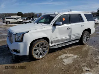 2016 GMC Yukon Denali with VIN 1GKS1CKJXGR299875, listed as a Copart auction lot 45533545 with 132,271 mi miles and Salvage Title. Bid and sale history available at carsss.com. Image 1.
