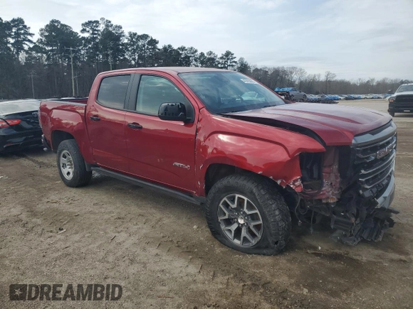 2021 GMC Canyon 4WD AT4 w/Leather with VIN 1GTG6FEN2M1224875, listed as a Copart auction lot 45553885 with 81,495 mi miles and Salvage Title. Bid and sale history available at carsss.com. Image 4.