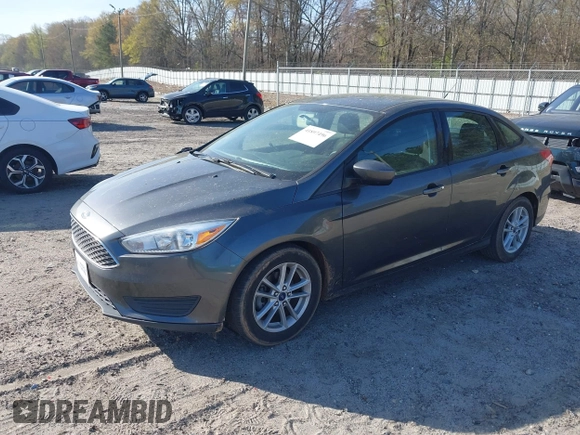 2018 Ford Focus SE with VIN 1FADP3F27JL294865, listed as a IAAI auction lot 41897496 with 100,048 mi miles and . Bid and sale history available at carsss.com. Image 2.
