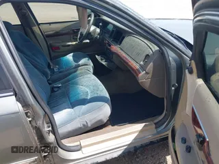 2002 Mercury Grand Marquis LS Premium z VIN 2MEFM75W22X617584, wystawiony jako IAAI lot #42444579 z przebiegiem 199 914 mil mil oraz . Historia ofert i sprzedaży dostępna na DreamBid. Obrazek 5.