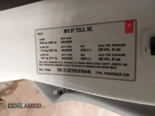 2018 Tesla Model 3 Long Range Battery with VIN 5YJ3E1EB5JF084446, listed as a IAAI auction lot 41209852 with 70,125 mi miles and . Bid and sale history available at DreamBid. Image 9.