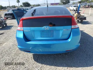 2010 Honda Insight EX with VIN JHMZE2H75AS006595, listed as a Copart auction lot 61078695 with 158,838 mi miles and Salvage title. Bid and sale history available at DreamBid. Image 6.