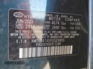 2023 Genesis G70 2.0T with VIN KMTG34TA5PU129955, listed as a Copart auction lot 82980774 with 12,625 mi miles and Salvage Title. Bid and sale history available at DreamBid. Image 13.