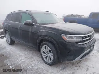 2021 Volkswagen Atlas 3.6L V6 SE w/Technology with VIN 1V2HR2CA9MC574558, listed as a IAAI auction lot 41296583 with 50,267 mi miles. Bid and sale history available at carsss.com. Image 1.