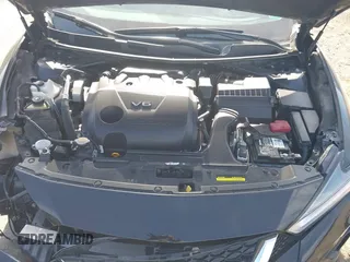 2019 Nissan Maxima SV with VIN 1N4AA6AV8KC371882, listed as a IAAI auction lot 41779671 with 107,296 mi miles and . Bid and sale history available at DreamBid. Image 10.