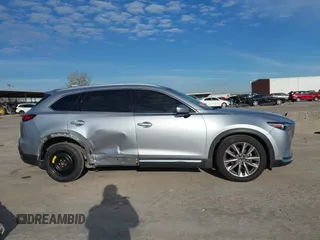 2020 Mazda CX-9 Grand Touring z VIN JM3TCADY7L0416696, wystawiony jako IAAI lot #41310183 z przebiegiem 105 754 mil mil oraz . Historia ofert i sprzedaży dostępna na DreamBid. Obrazek 13.