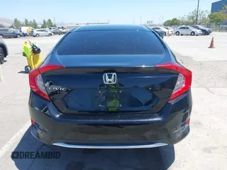 2020 Honda Civic LX with VIN 19XFC2F66LE213975, listed as a IAAI auction lot 42398098 with 69,902 mi miles and . Bid and sale history available at DreamBid. Image 16.