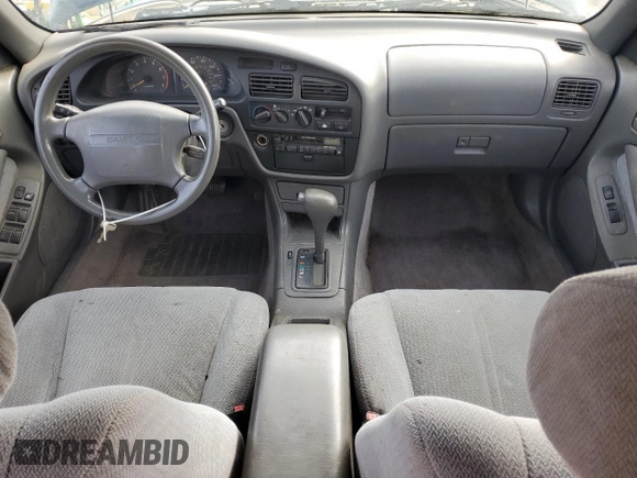 1995 Toyota Camry LE z VIN 4T1GK12W4SU079938, wystawiony jako Copart lot #77065084 z przebiegiem 222 731 mil mil oraz Szkoda całkowita • Salvage title. Historia ofert i sprzedaży dostępna na DreamBid. Obrazek 8.