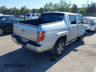 2012 Honda Ridgeline RTL with VIN 5FPYK1F56CB457687, listed as a IAAI auction lot 42582331 with 96,357 mi miles and . Bid and sale history available at DreamBid. Image 4.