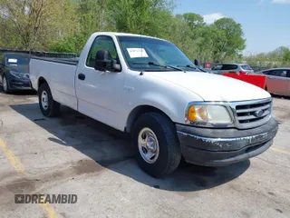 2000 Ford F-150 XL with VIN 1FTZF1722YNC22573, listed as a IAAI auction lot 42072234 with 152,494 mi miles and . Bid and sale history available at DreamBid. Image 1.