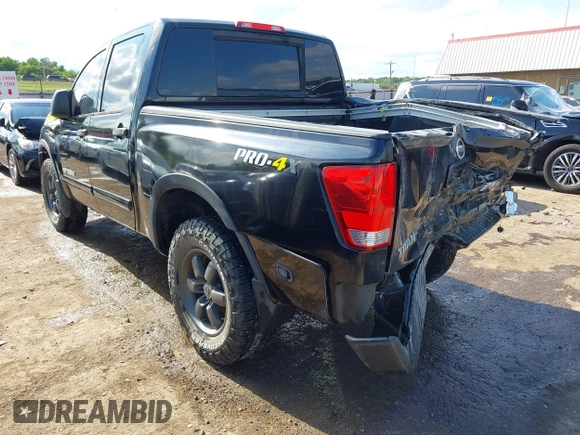 2013 Nissan Titan Pro-4X with VIN 1N6BA0EC4DN305032, listed as a IAAI auction lot 42341681 with 118,251 mi miles and . Bid and sale history available at DreamBid. Image 3.