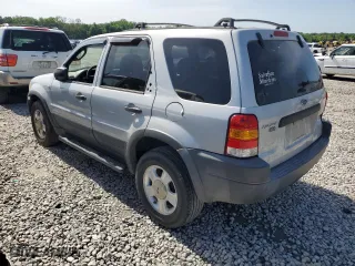 2002 Ford Escape XLT Choice with VIN 1FMYU03162KB99358, listed as a Copart auction lot 54183524 with 292,653 mi miles and Salvage Title. Bid and sale history available at carsss.com. Image 2.