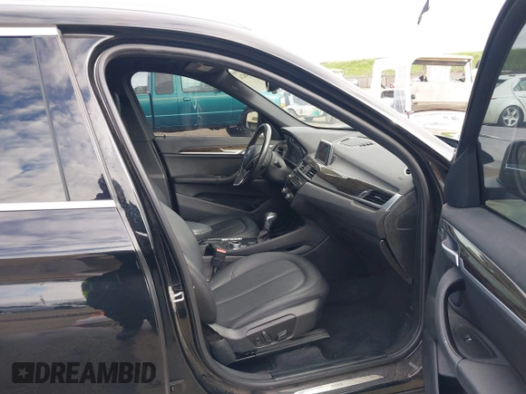 2017 BMW X1 sDrive28i with VIN WBXHU7C3XHP924635, listed as a IAAI auction lot 41744824 with 74,143 mi miles. Bid and sale history available at carsss.com. Image 5.