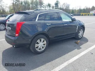 2012 Cadillac SRX Luxury Collection with VIN 3GYFNDE3XCS582993, listed as a IAAI auction lot 42165864 with 137,009 mi miles. Bid and sale history available at carsss.com. Image 4.