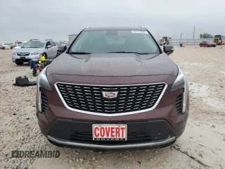 2023 Cadillac XT4 FWD Premium Luxury with VIN 1GYFZCR48PF100078, listed as a Copart auction lot 55955865 with 23,509 mi miles and Salvage title. Bid and sale history available at DreamBid. Image 5.