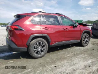 2023 Toyota RAV4 Hybrid XLE Premium with VIN JTMB6RFV2PD541262, listed as a Copart auction lot 60106845 with 32,447 mi miles and Salvage title. Bid and sale history available at DreamBid. Image 3.