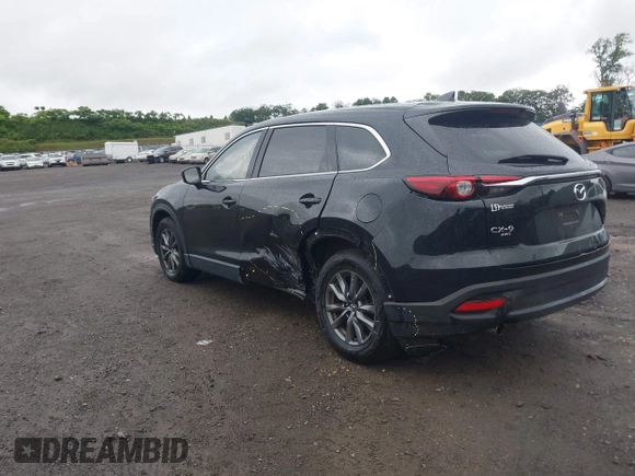 2020 Mazda CX-9 Touring with VIN JM3TCBCY5L0422262, listed as a IAAI auction lot 42456246 with 69,211 mi miles and . Bid and sale history available at DreamBid. Image 3.
