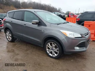 2013 Ford Escape SEL z VIN 1FMCU9H96DUD50249, wystawiony jako IAAI lot #41210088 z przebiegiem 208 582 mil mil oraz . Historia ofert i sprzedaży dostępna na DreamBid. Obrazek 1.