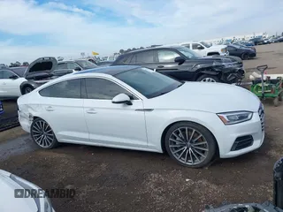 2018 Audi A5 Sportback Premium Plus z VIN WAUBNCF57JA119316, wystawiony jako IAAI lot #38568041 z przebiegiem 101 719 mil mil oraz . Historia ofert i sprzedaży dostępna na DreamBid. Obrazek 13.
