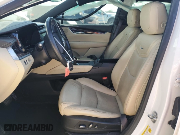 2018 Cadillac XT5 Premium Luxury FWD z VIN 1GYKNERS6JZ102163, wystawiony jako Copart lot #52817895 z przebiegiem 167 570 mil mil oraz Nie do naprawy. Historia ofert i sprzedaży dostępna na DreamBid. Obrazek 7.