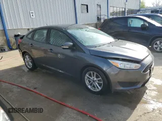 2016 Ford Focus SE with VIN 1FADP3F21GL335905, listed as a Copart auction lot 53837225 with 149,043 mi miles and Salvage title. Bid and sale history available at DreamBid. Image 4.