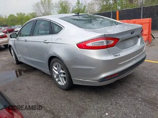 2013 Ford Fusion SE z VIN 3FA6P0HR3DR148664, wystawiony jako IAAI lot #42057963 z przebiegiem 239 120 mil mil oraz . Historia ofert i sprzedaży dostępna na DreamBid. Obrazek 3.