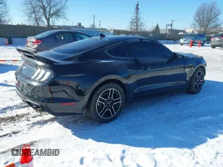 2021 Ford Mustang GT with VIN 1FA6P8CF3M5125450, listed as a IAAI auction lot 41632279 with 66,839 mi miles. Bid and sale history available at carsss.com. Image 4.