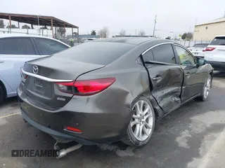 2016 Mazda 6 i Touring with VIN JM1GJ1V52G1473330, listed as a IAAI auction lot 41657684 with 138,064 mi miles and . Bid and sale history available at DreamBid. Image 4.