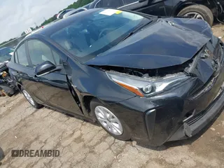 2022 Toyota Prius L Eco z VIN JTDKAMFU8N3181135, wystawiony jako IAAI lot #42098611 z przebiegiem 69 949 mil mil oraz . Historia ofert i sprzedaży dostępna na DreamBid. Obrazek 1.