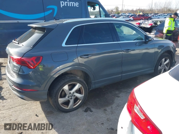 2019 Audi Q3 Premium with VIN WA1AECF34K1077065, listed as a IAAI auction lot 40826923 with 85,458 mi miles and . Bid and sale history available at DreamBid. Image 4.