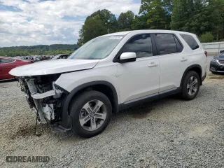 2025 Honda Pilot EX-L with VIN 5FNYG2H40SB005656, listed as a Copart auction lot 67875224 with 7,080 mi miles and Salvage Title. Bid and sale history available at carsss.com. Image 1.