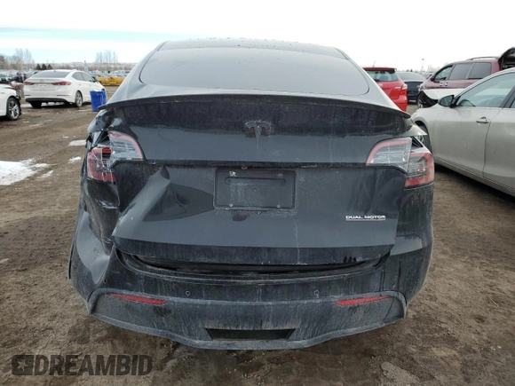 2022 Tesla Model Y Performance z VIN 7SAYGDEF5NF512464, wystawiony jako Copart lot #46337165 z przebiegiem 74 761 mil mil oraz Szkoda całkowita • Salvage title. Historia ofert i sprzedaży dostępna na DreamBid. Obrazek 6.