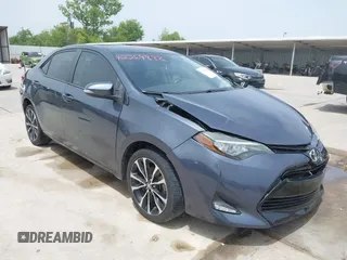 2018 Toyota Corolla L with VIN 2T1BURHE3JC047256, listed as a IAAI auction lot 42264888 with 88,605 mi miles and . Bid and sale history available at DreamBid. Image 1.