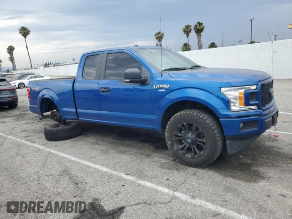 2018 Ford F-150 XL with VIN 1FTEX1CP9JKC83813, listed as a Copart auction lot 59342735 with 63,106 mi miles and Salvage title. Bid and sale history available at DreamBid. Image 4.