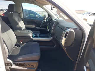 2018 Chevrolet Silverado 1500 LT with VIN 1GCRCREC4JZ368426, listed as a IAAI auction lot 41343347 with 114,821 mi miles and . Bid and sale history available at DreamBid. Image 5.