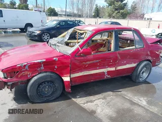 1990 Mitsubishi Mirage z VIN JA3CU26X2LU049259, wystawiony jako IAAI lot #41788912 z przebiegiem Nie podano mil oraz . Historia ofert i sprzedaży dostępna na DreamBid. Obrazek 6.