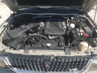 1999 Mitsubishi Montero LS z VIN JA4LS31H8XP026225, wystawiony jako Copart lot #71874604 z przebiegiem 243 182 mil mil oraz Szkody całkowita. Historia ofert i sprzedaży dostępna na DreamBid. Obrazek 12.