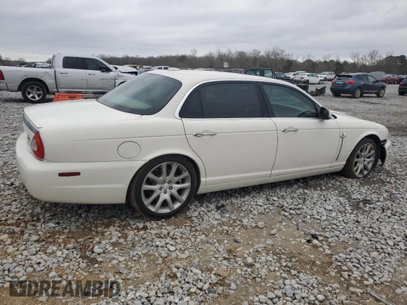 2008 Jaguar XJ with VIN SAJWA79B48SH21186, listed as a Copart auction lot 43704975 with 197,944 mi miles and Salvage Title. Bid and sale history available at carsss.com. Image 3.