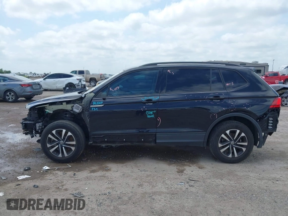2022 Volkswagen Tiguan S with VIN 3VV0B7AX7NM137070, listed as a IAAI auction lot 42492020 with 24,396 mi miles and . Bid and sale history available at DreamBid. Image 14.