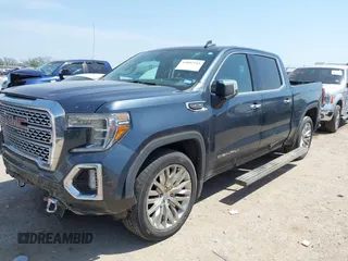2019 GMC Sierra 1500 Denali z VIN 1GTU9FEL5KZ387012, wystawiony jako IAAI lot #42002743 z przebiegiem 124 718 mil mil oraz . Historia ofert i sprzedaży dostępna na DreamBid. Obrazek 17.