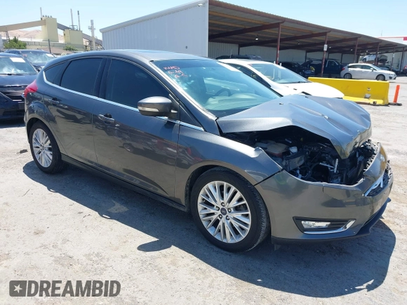 2018 Ford Focus Titanium with VIN 1FADP3N28JL232120, listed as a IAAI auction lot 42544070 with 28,661 mi miles and . Bid and sale history available at DreamBid. Image 1.