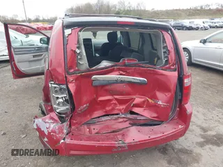 2009 Dodge Grand Caravan SXT z VIN 2D8HN54X69R593635, wystawiony jako IAAI lot #39235325 z przebiegiem 207 996 mil mil oraz . Historia ofert i sprzedaży dostępna na DreamBid. Obrazek 6.