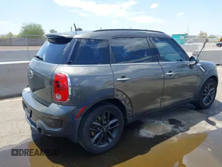 2014 MINI Countryman S with VIN WMWZC3C59EWP29137, listed as a IAAI auction lot 42661922 with 128,064 mi miles and . Bid and sale history available at DreamBid. Image 6.