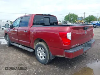 2017 Nissan Titan SV with VIN 1N6AA1E66HN563991, listed as a IAAI auction lot 42639581 with 183,449 mi miles and . Bid and sale history available at DreamBid. Image 3.