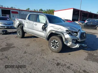 2021 Toyota Tacoma 4WD SR with VIN 5TFCZ5ANXMX272577, listed as a IAAI auction lot 41772993 with 51,208 mi miles. Bid and sale history available at carsss.com. Image 1.