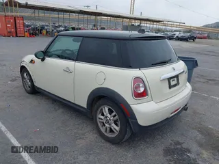 2011 MINI Hardtop with VIN WMWSU3C50BT093428, listed as a IAAI auction lot 41895788 with 173,501 mi miles and . Bid and sale history available at DreamBid. Image 3.