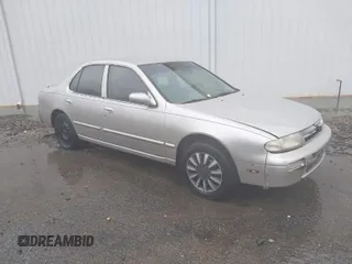 1996 Nissan Altima XE with VIN 1N4BU31D2TC138549, listed as a IAAI auction lot 41969953 with 88,187 mi miles and . Bid and sale history available at DreamBid. Image 1.