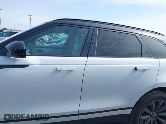 2018 Land Rover Range Rover Velar R-Dynamic SE with VIN SALYL2RX6JA737911, listed as a IAAI auction lot 41597945 with 67,656 mi miles and . Bid and sale history available at DreamBid. Image 14.